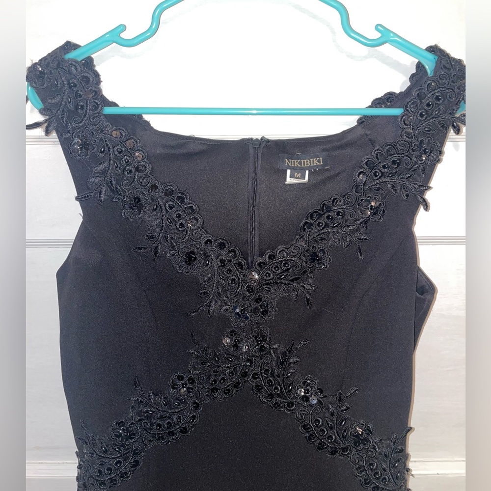 NIKIBIKI Off the Shoulder Black Mini Dress with Front Detailing
